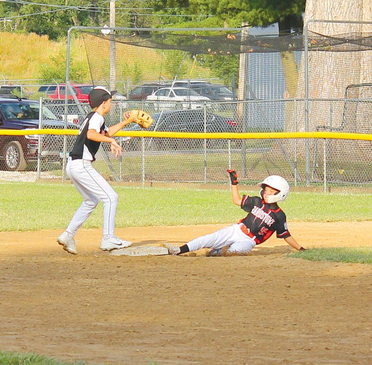 Quinn Richard slides safely into second for Beardstown.
