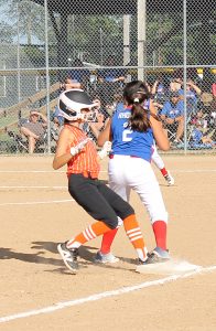 The runner is safe at third in an opening round loss for the Beardstown 9/10 year old softball all stars.