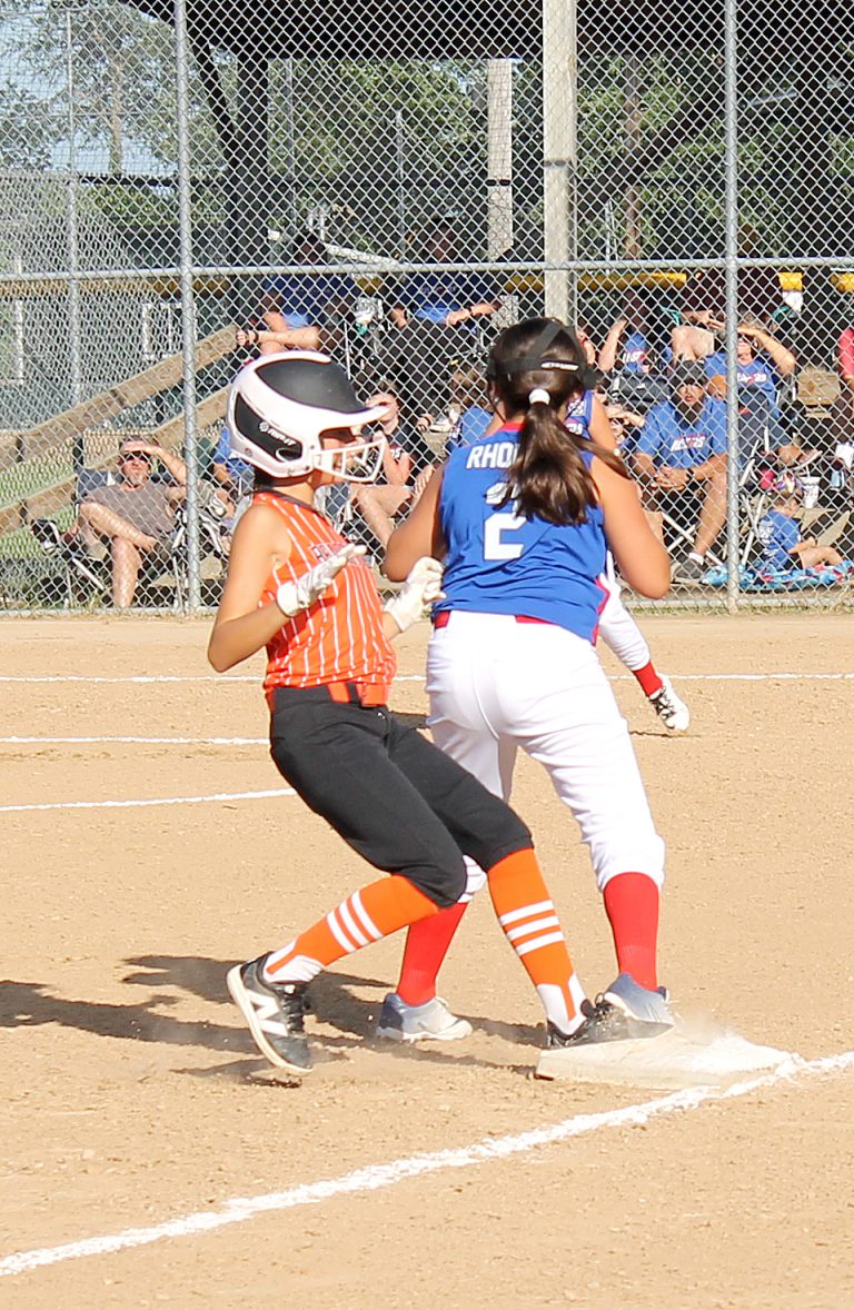 The runner is safe at third in an opening round loss for the Beardstown 9/10 year old softball all stars.