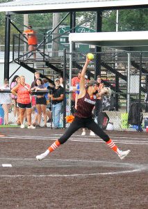 Tiger ace Maci Savage comes completely off the ground to deliver the heat in State Tourney action.