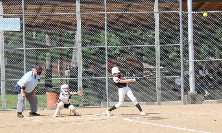 Mia Simpson blasts a double to right center for the Lady Tigers against Midwest Central.