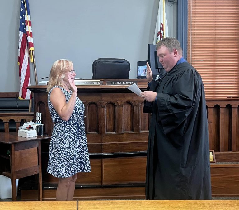 Angela VanBrooker, left, and Judge Timothy Wessel, right.