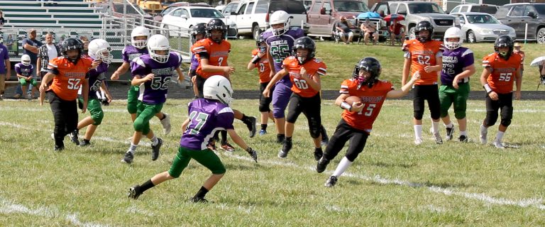 The Beardstown Junior Football League 5th/6th grade team gets a nice gain behind some good blocking in their game at South Fulton.