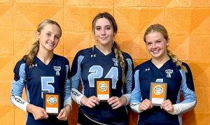Triopia-Meredosia-Virginia volleyball players (L/R) Mylee Tracy, Chelsea Bell and Lucie Dion were named All-Tournament at the Meredosia Tournament.