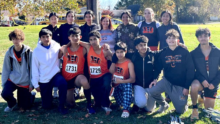 The boys and girls Cross Country teams for Beardstown and coach Jacki Kelly are pictured after the Regional Meet where the Tigers qualified for Sectionals.