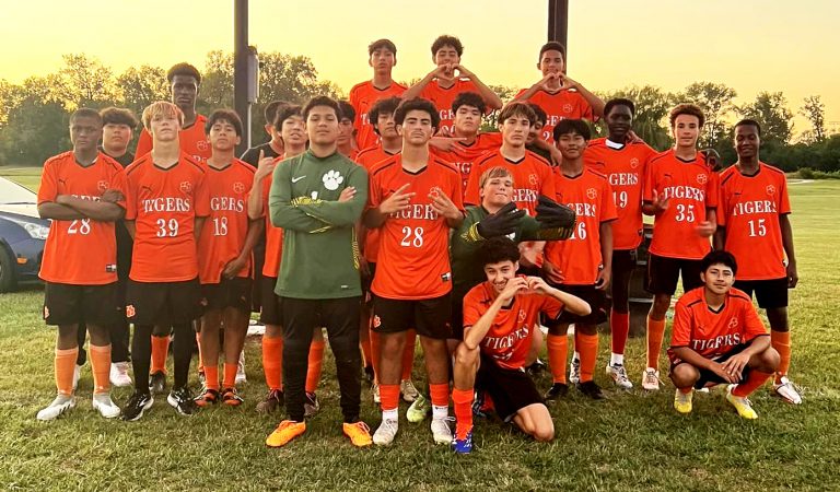 The BHS Varsity soccer team celebrates their win over Lincoln.