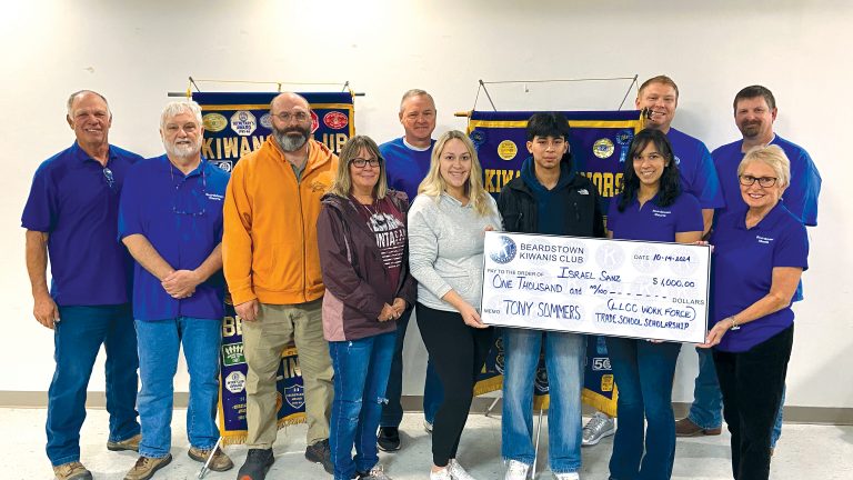 Pictured left to right: Jack Fearneyhough, Steve Daniel, Eric Snellgrove, Vonda Sommers, Dale Krohe, Paige Seward, Israel Sanz, Club President Angie Lunsford, Rich Eckert, Marti Fearneyhough and Wells Petersen.