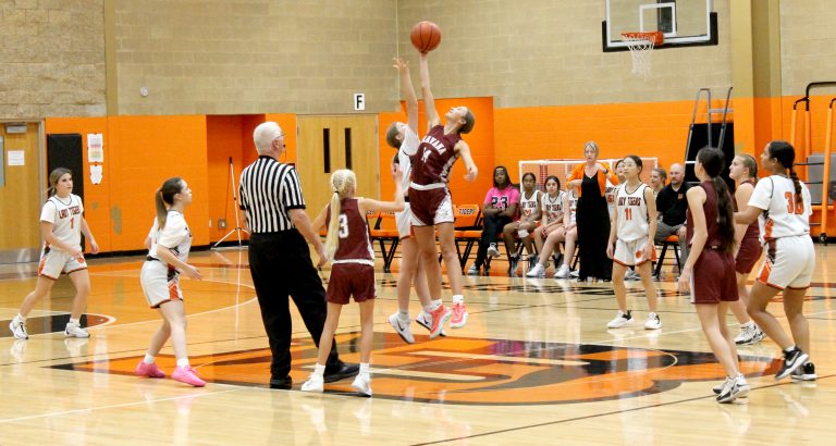 Alas, the Ducks win the tip in this eighth grade contest.