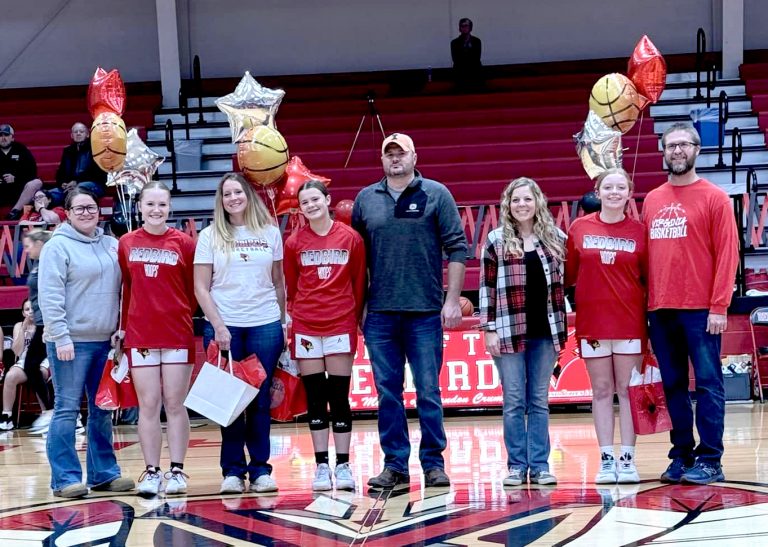 The Virginia-Meredosia-Triopia 8th grade girls basketball players and families were honored before last Thursday’s game.