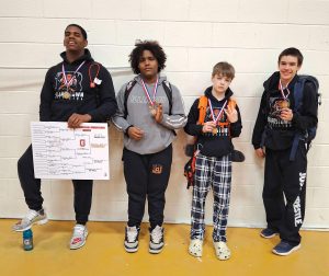 Chatham Glenwood Junior High Wrestling Invite Placers for Beardstown from left to right: Pedro Mendoza 1st, Yahndiel Santiago 2nd, Jude Dawson 3rd, Tristan Jones 3rd.