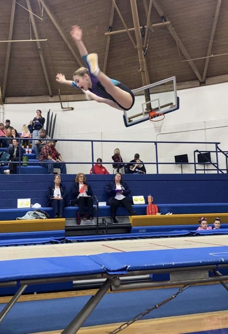 Vivian Campbell competing her straddle jump on trampoline in the beginner level. She placed first in this event at this meet. She is a 1st grader at Washington Elementary in Rushville and proud parents are Michael and Alyssa Campbell.