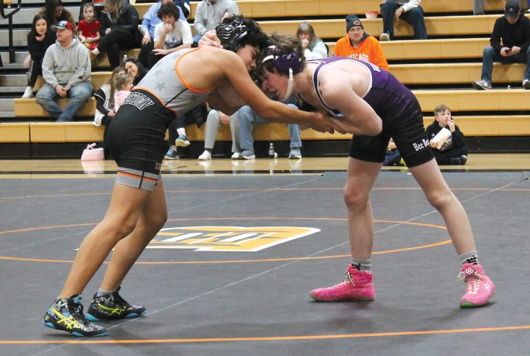 Roger Gil locks up with his opponent for the Beardstown Junior High Wrestling team.